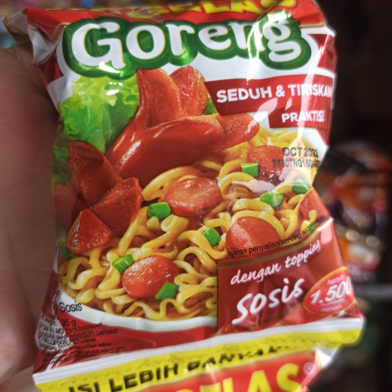 

Migelas Mie Gelas Goreng Dengan Toping Sosis