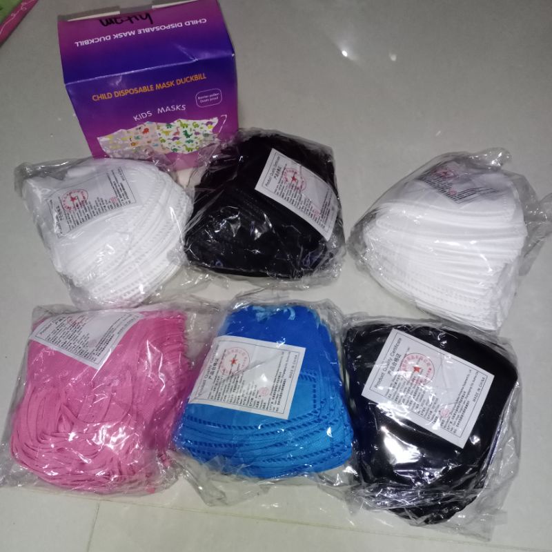 masker duckbill anak polos warna isi 50