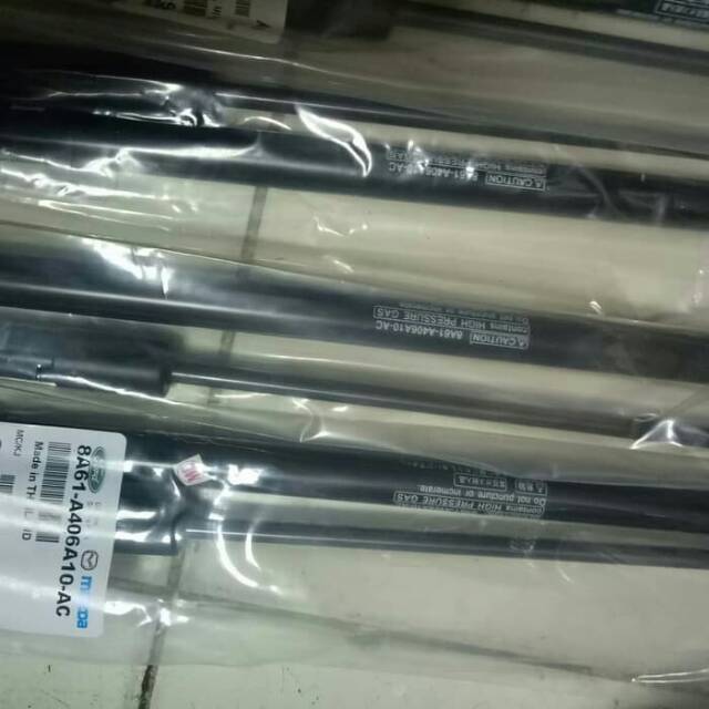 Shock bagasi mazda 2