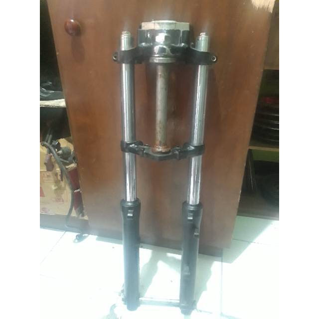 Shock depan tiger revo ori