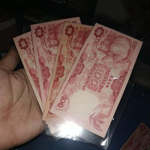 (GRESS/AU/UNC) Uang kuno 100 rupiah badak tahun 1977