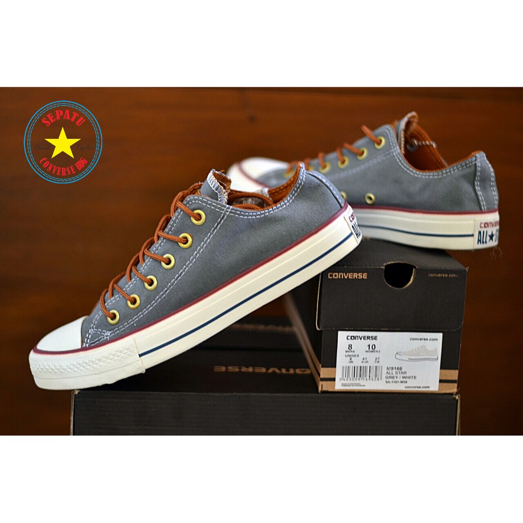 tan low top converse