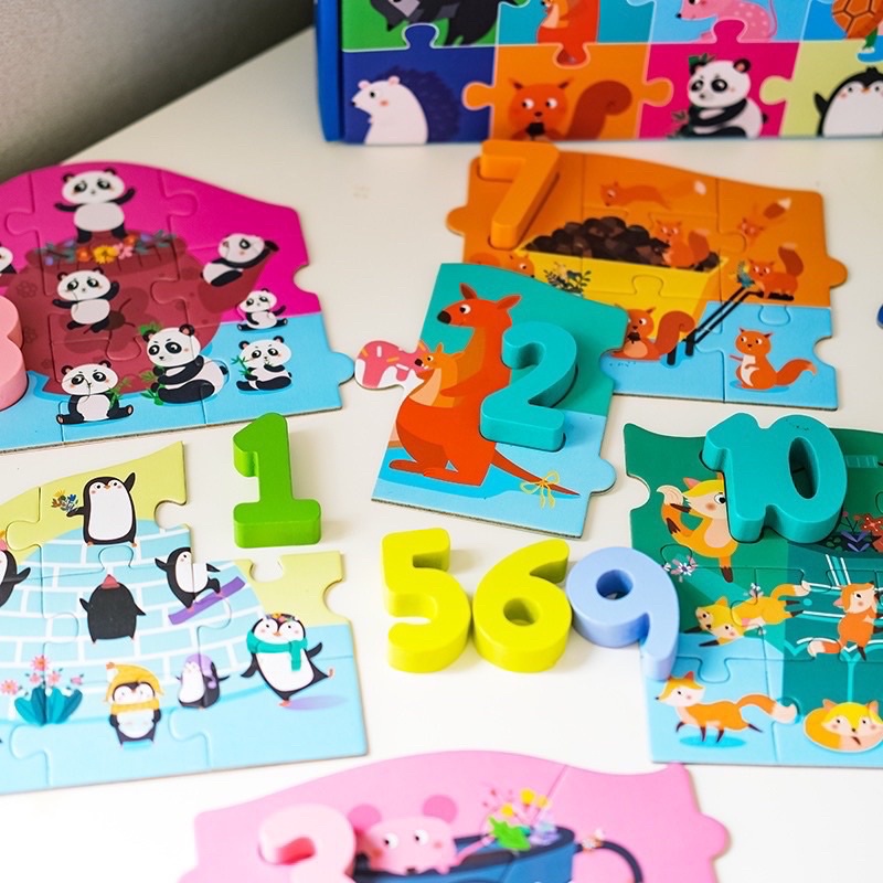 number alphabeth puzzle with wooden pieces