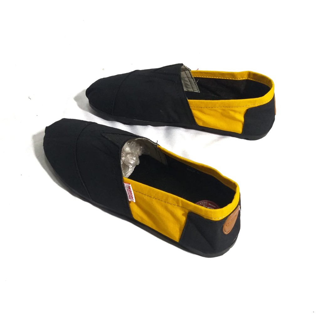 sepatu slip on pria/wanita santay hitamkuning terbaru 2021 size 36-43