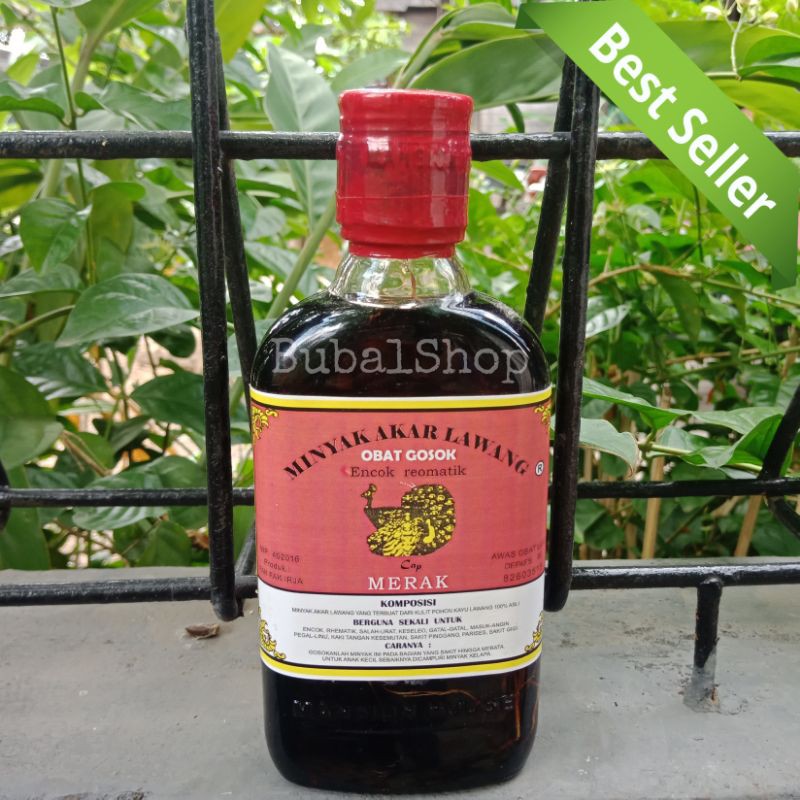 Minyak gosok urut akar lawang asli cap merak