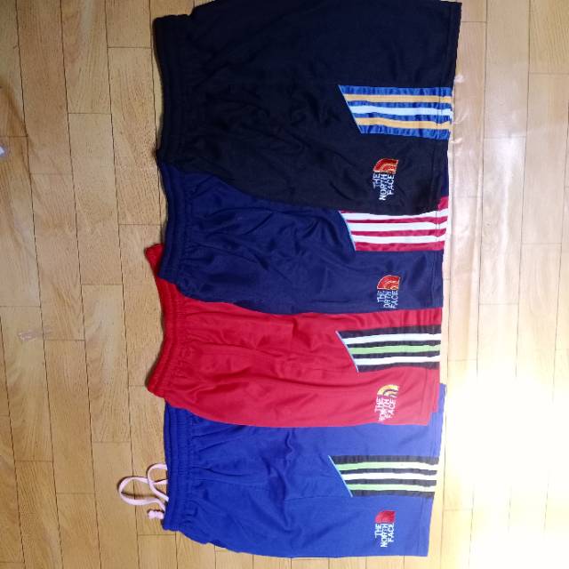 Celana pendek pria futsal di atas lutut lotto olahraga