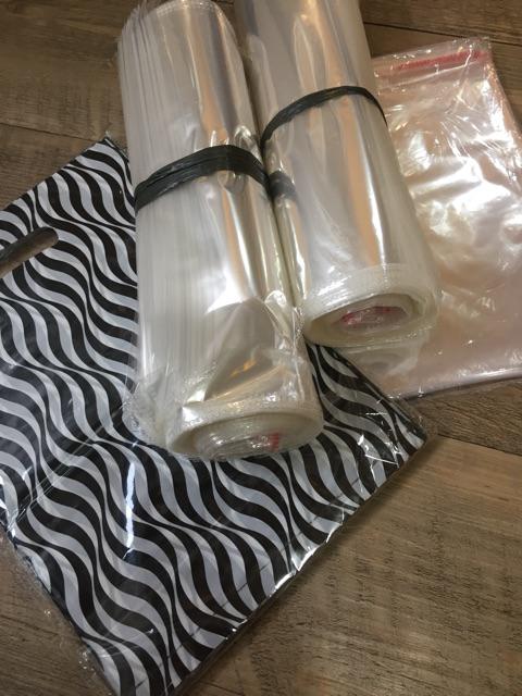 Plastik Bungkus Packing Baju Opp Uk. 28