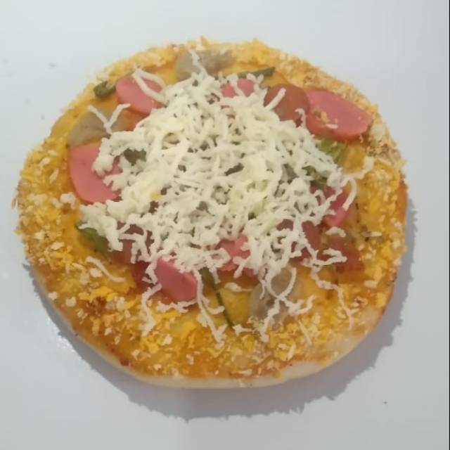 

Pizza Mini Frozen. Ukuran 12cm.