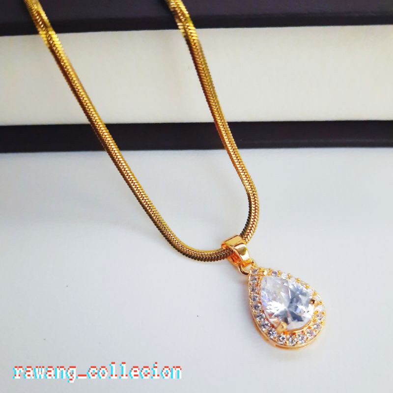 kalung titanium gold belut plus liontin permata putih