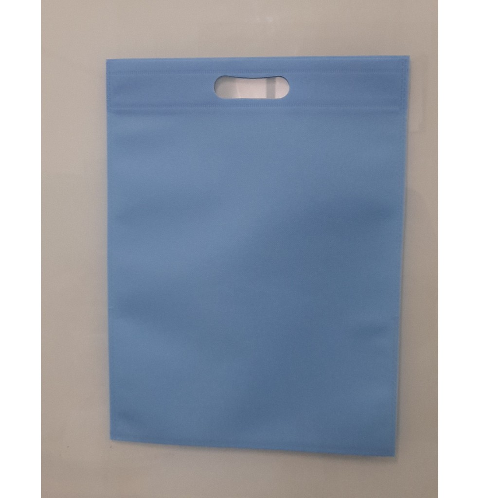 

Tas Press Spunbound Oval Goodie Bag Tas Belanja Warna Baby Blue 30 cm x 40 cm