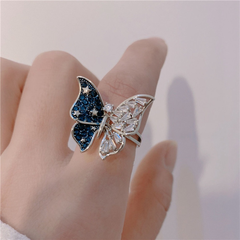 Cincin Model Terbuka Adjustable Desain Kupu-Kupu Biru Aksen Zircon Untuk Wanita