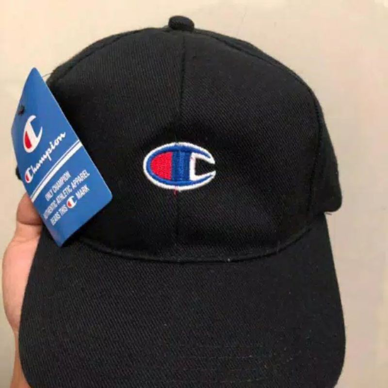 TOPI CHAMPIONS LOGO HITAM