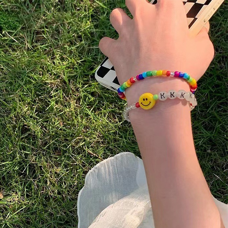 Gelang Manikmanik Elastis Handmade Aneka Warna Dengan Charm Smiley Face Untuk Wanita