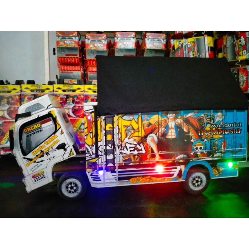 Mobil oleng Miniatur truk JUMBO( P.45 L.15 T.20) variasi lampu terpal variasi non lampu