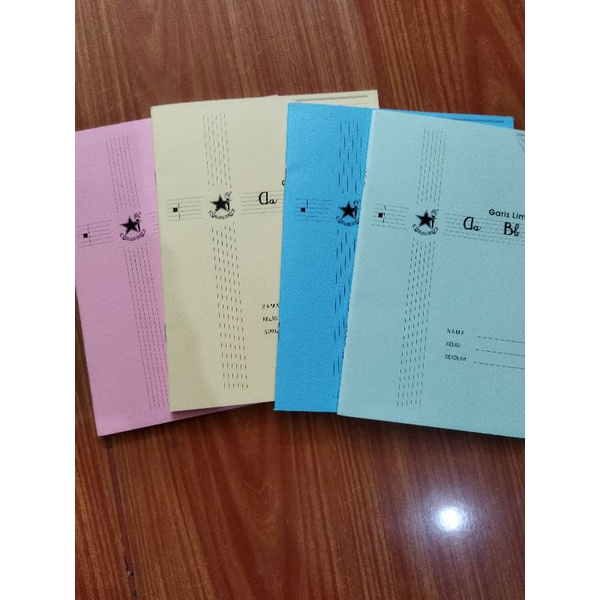 

Buku Tulis Tegak Bersambung Garis 5