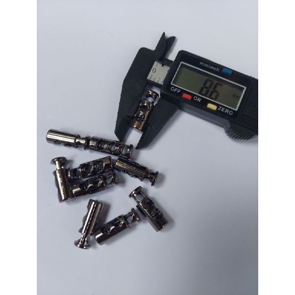 stopper metal tali serut cord lock besi model botol 2 lubang