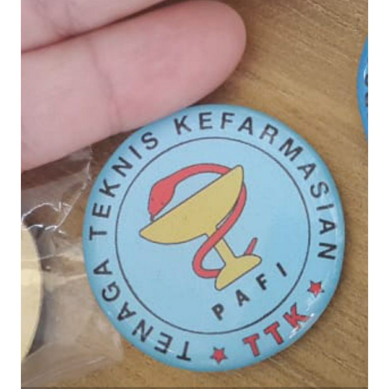 Pin TTK (Tenaga Teknis Kefarmasian) / PAFI warna Biru pekat dan Biru muda. Bisa klik pilihan warnanya