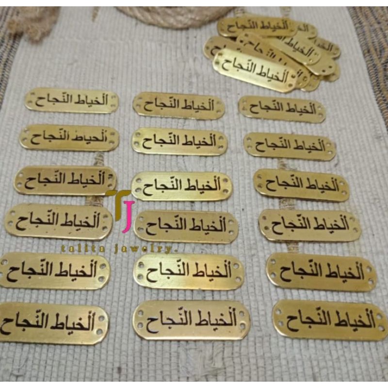 label baju,label plat hijab logam anti karat