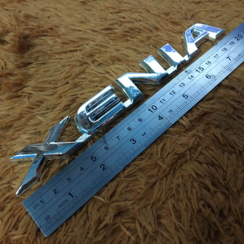 Emblem Daihatsu Xenia belakang