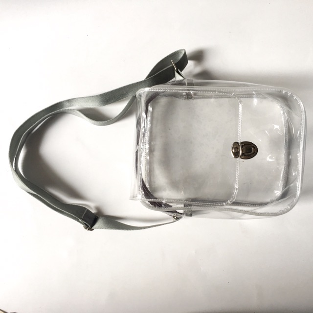 Tas selempang transparan tutup kunci