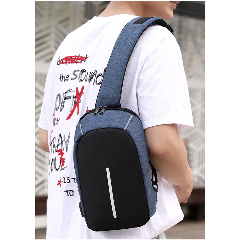 - BISA COD - USB Charger Tas Selempang Pria Sling Bag ANTI MALING Thief Fashion Sporty Travel Import