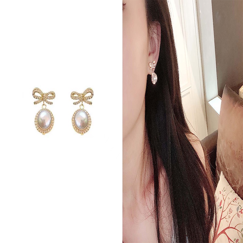 1 Pasang Anting Stud Desain Pita Mutiara Berlian Gaya Korea Untuk Wanita