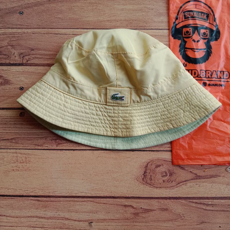 Topi bucket Lacoste