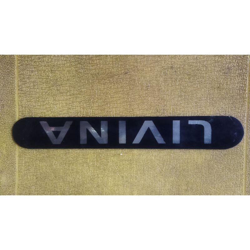 emblem tulisan LIVINA untuk bemper belakang