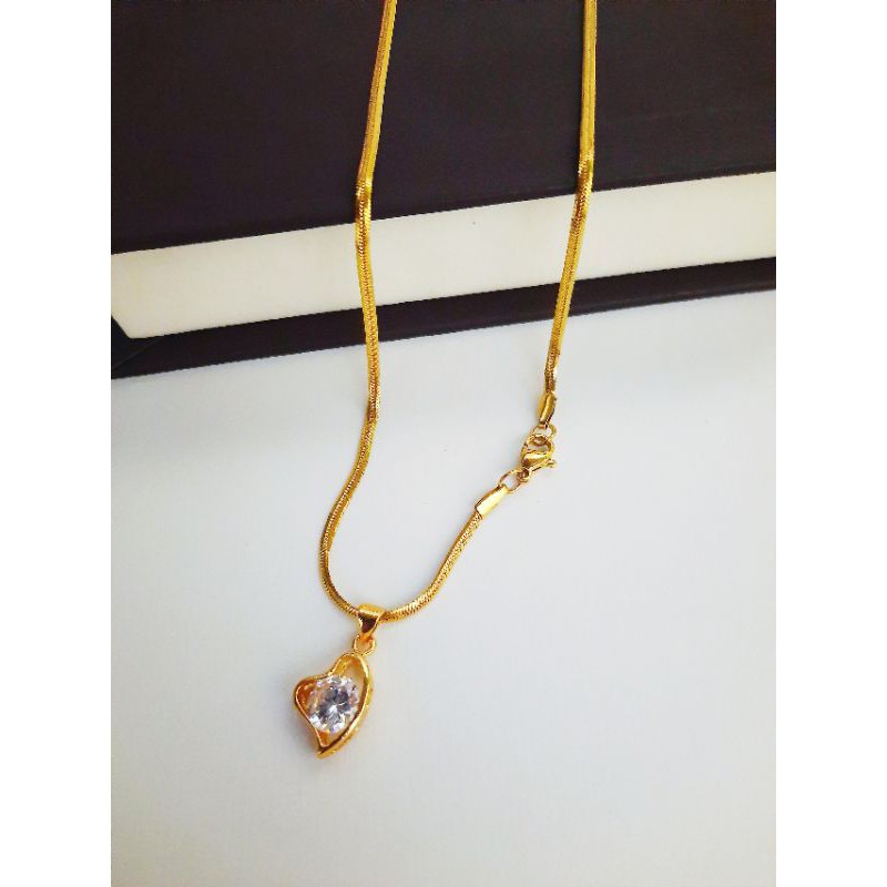 kalung titanium gold belut plus liontin love permata