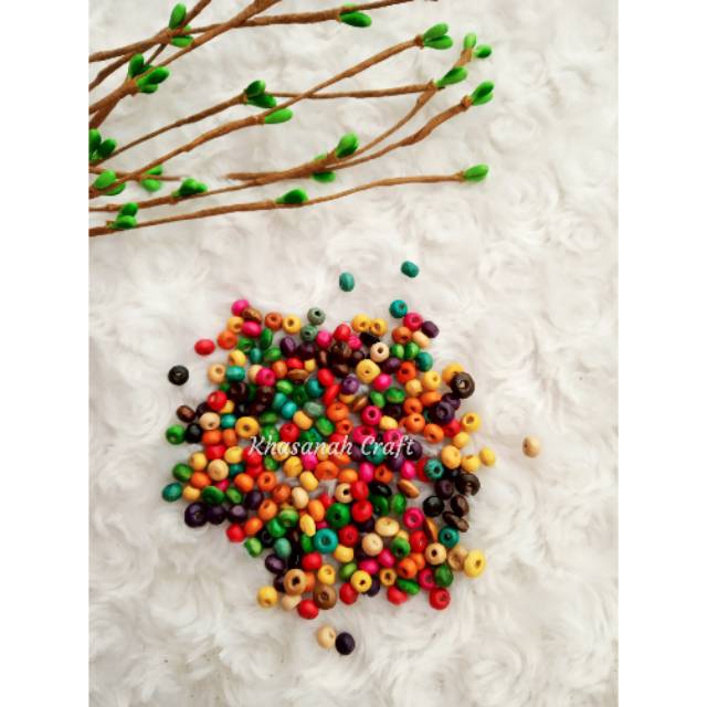 Manik manik kayu bulat