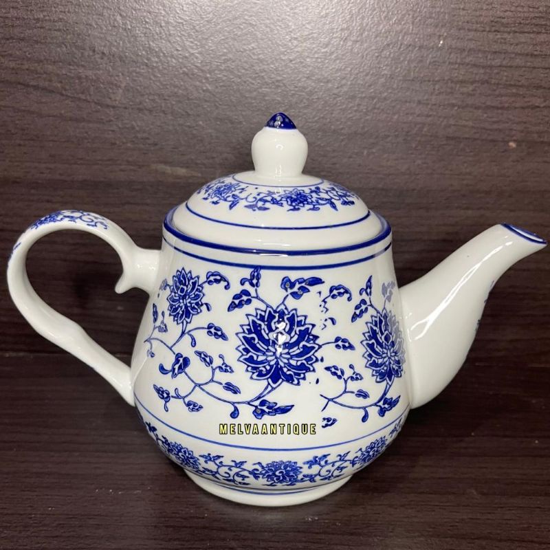 Teko keramik biru putih motif bunga