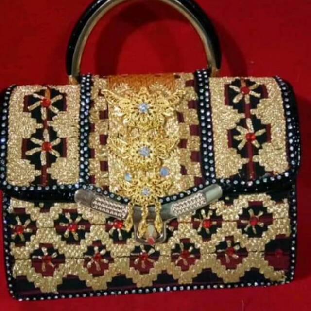 Tas tapis asli