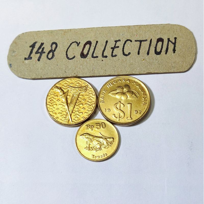 Koin asing Malaysia 1 ringgit keris