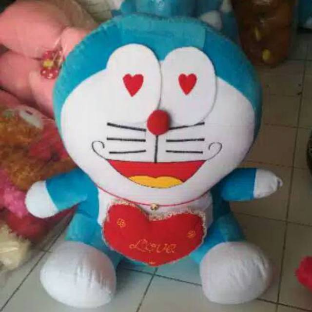 Boneka Doraemon love jumbo.