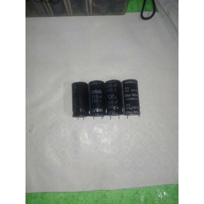 Capasitor 330uf 200v.elco 330uf 200v.kapasitor elektrik 330uf 200v.elko elektrik 330uf 200v