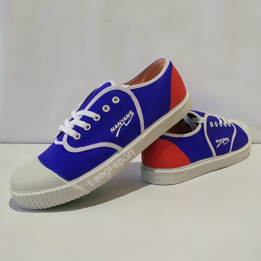 Sepatu nanyang motif biru merah polos