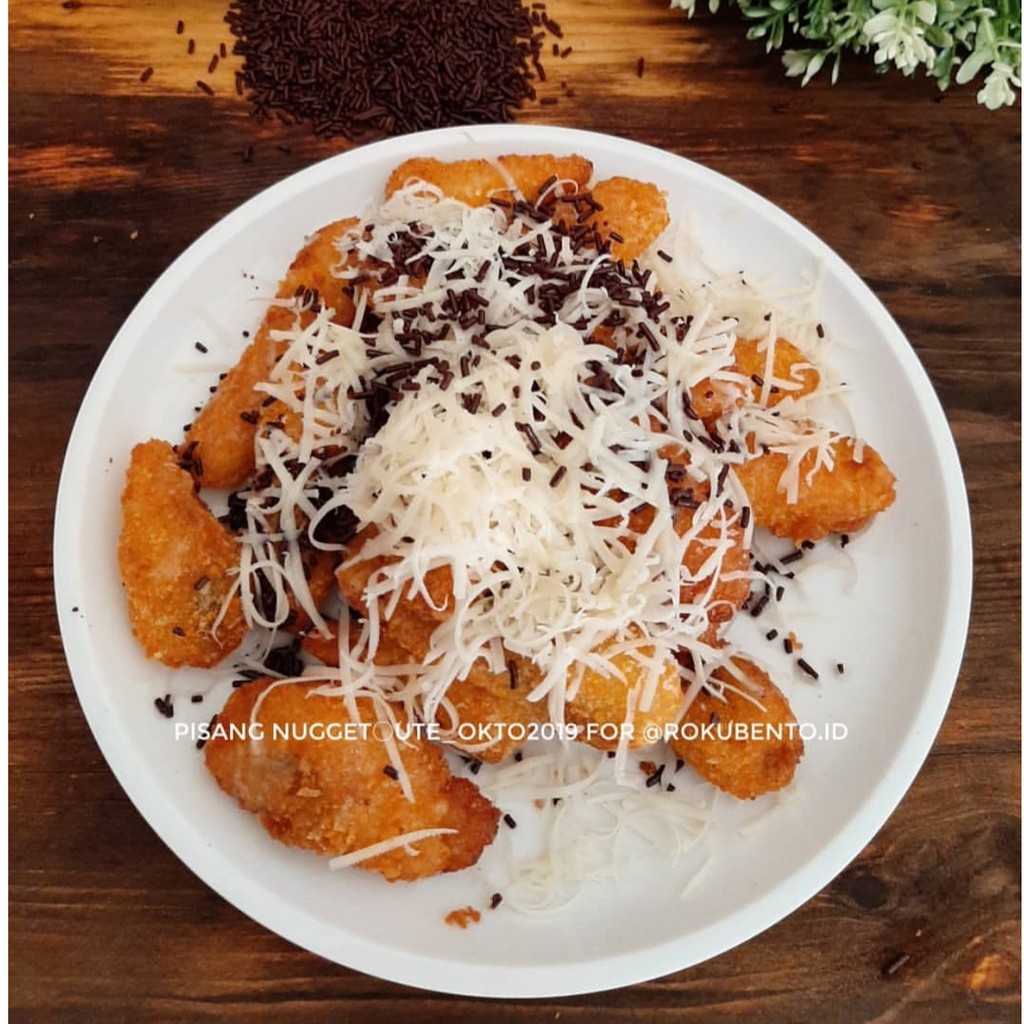 

Banana Nugget / Pisang Kepok Crispy 500Gr Roku Bento Bandung Nugget Pisang Cemilan Siap Goreng