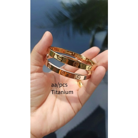 ASLI TITANIUM CARTIER POLOS KODE 750 DEWASA 01