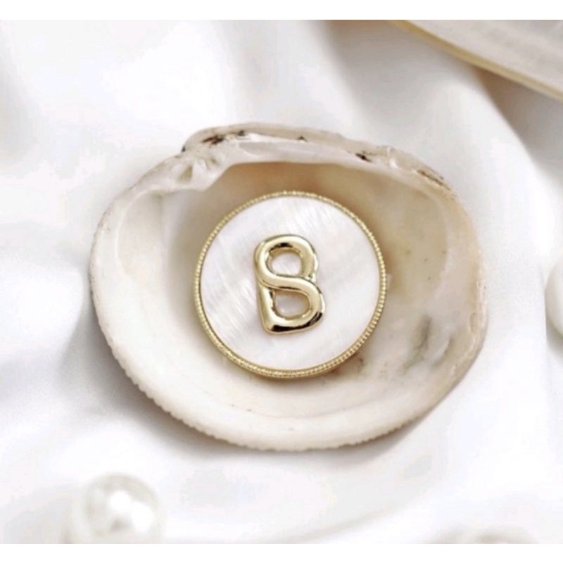 white shell brooch buttonscarves