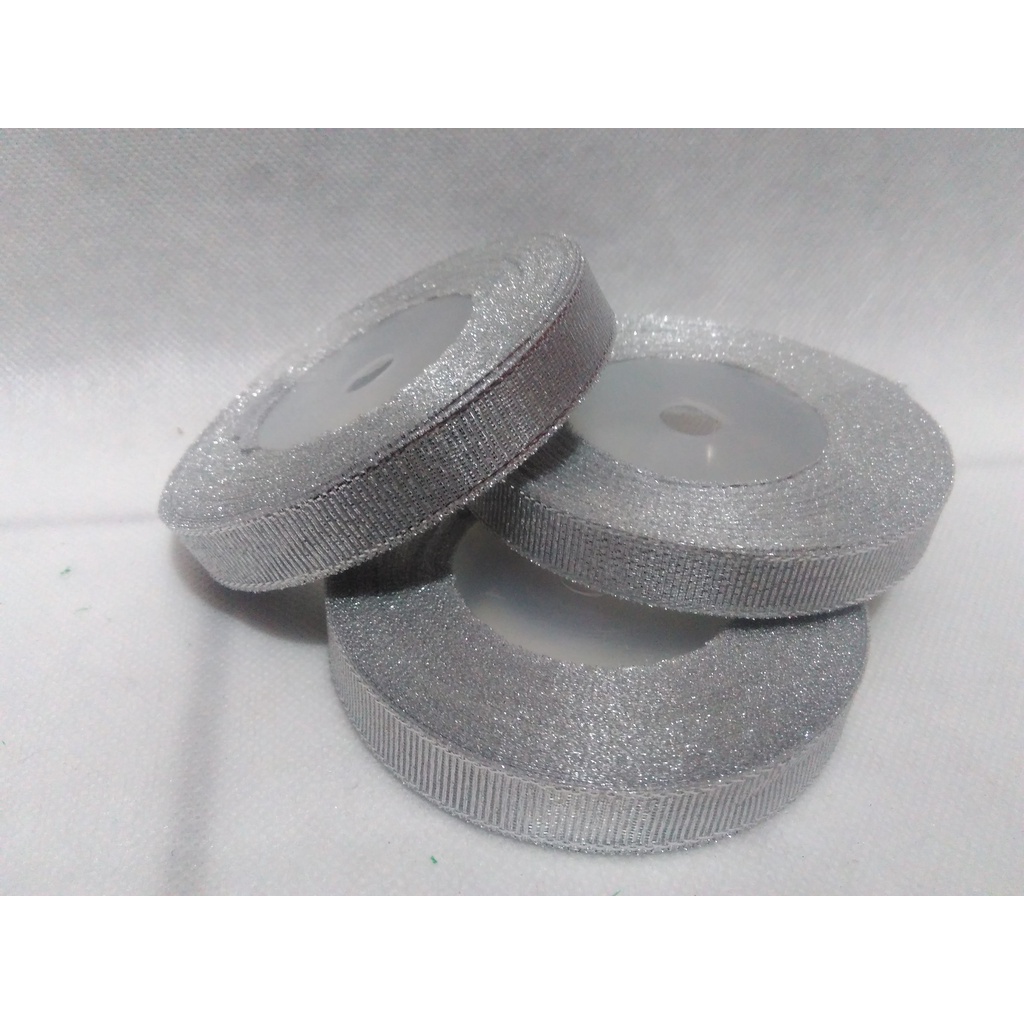 

Pita Glitter Silver Ukuran 1/2inch Per Roll.
