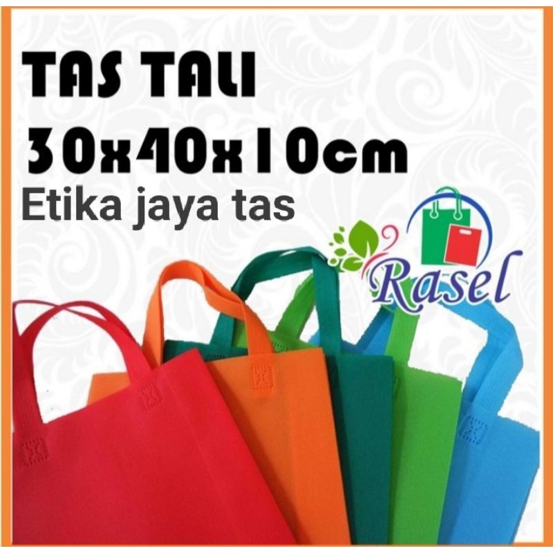 tas press/tas spunbond goodie bag tali uk jumbo/besar/kecil(20x25 , 25x35 , 30x40 , 38x45 ) untuk kantong belanja lipat