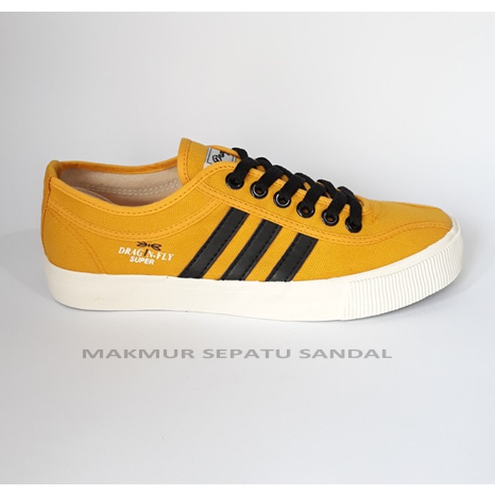 Sepatu Ket Olahraga Lari Joging Futsal Putih White Lotto Pria Uku KL615 Sepatu Capung - Dragonfly