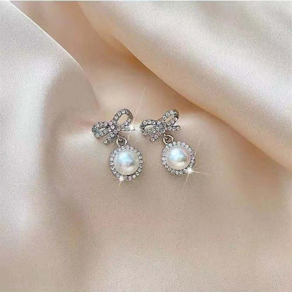 1 Pasang Anting Stud Desain Pita Mutiara Berlian Gaya Korea Untuk Wanita