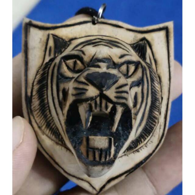 Ontine ukiran macan 3D bahan kayu keramat kaboa sancang