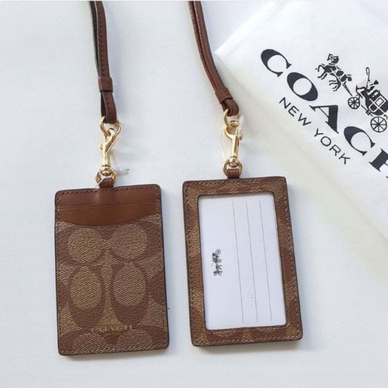 

Coach Lanyard Signature Saddle