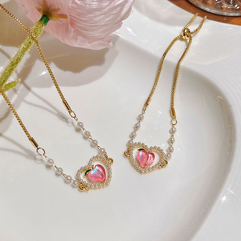 Set Kalung + Gelang + Anting Gantung Tusuk Motif Hati Aksen Mutiara + Hollow Untuk Perhiasan Wanita