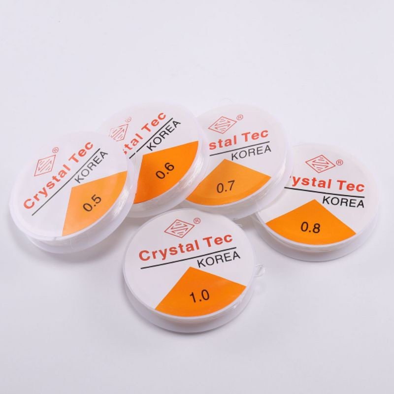 Tali Karet Bening Senar Elastis Crystal Tec Korea 0,6mm - 1,0mm