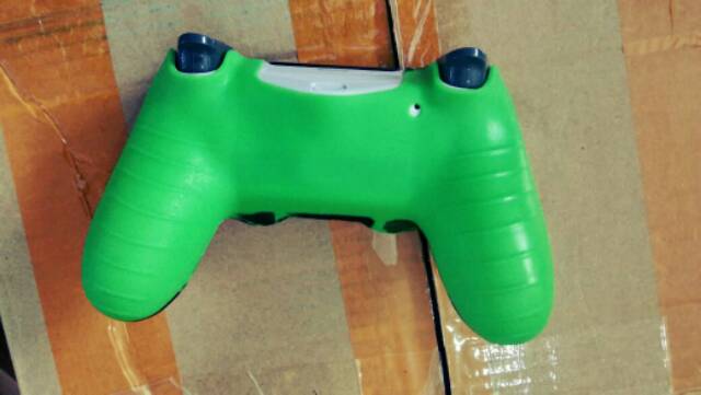 silicone atau kondom.stik ps4 army hijau