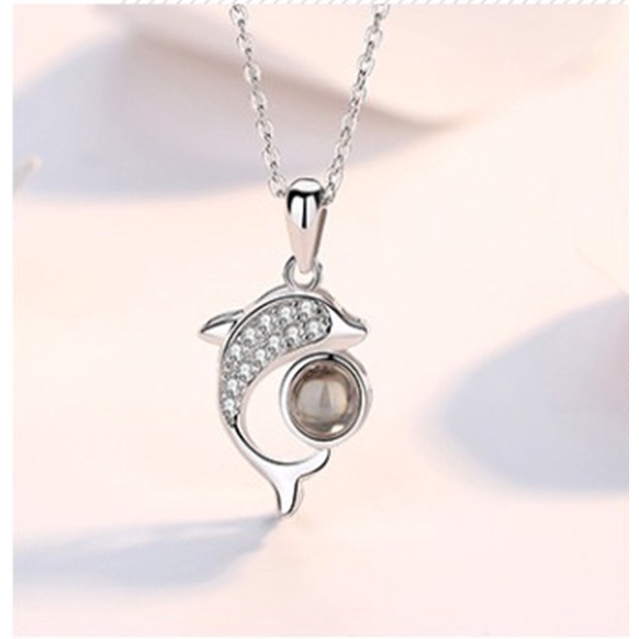 Kalung Liontin Lumba-Lumba Model Hollow Out Bahan Stainless Steel Warna Rose Gold Untuk Wanita