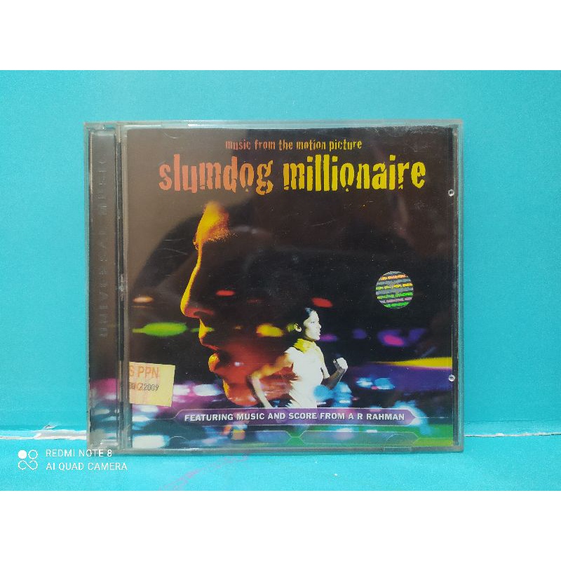 Audio CD : music from the motion picture - slumdog millionaire.